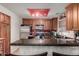 Functional kitchen with stainless steel appliances, ample cabinet space, and granite counters at 11375 E Sahuaro Dr # 1062, Scottsdale, AZ 85259