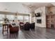 Comfortable living room with a fireplace and ample seating at 11375 E Sahuaro Dr # 1062, Scottsdale, AZ 85259
