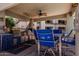 An outdoor kitchen area with stainless steel grills and a covered seating area at 11375 E Sahuaro Dr # 1062, Scottsdale, AZ 85259