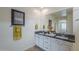 Bright bathroom showcasing double sinks with granite countertops and modern fixtures at 11470 E Yeager Cyn, Gold Canyon, AZ 85118