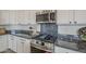 Close-up of modern kitchen with stainless steel appliances and granite countertops at 11470 E Yeager Cyn, Gold Canyon, AZ 85118