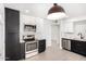 Modern kitchen with stainless steel appliances, stylish white backsplash and sleek cabinetry at 12453 N 29Th Ave, Phoenix, AZ 85029