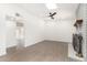 Airy living room featuring stylish gray floors and a sleek ceiling fan at 12453 N 29Th Ave, Phoenix, AZ 85029