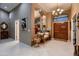 Grand foyer featuring tile flooring, high ceilings, and elegant chandelier at 12754 E Laurel Ln, Scottsdale, AZ 85259