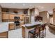 Well-equipped kitchen with stainless steel appliances, a breakfast bar, and ample counter space at 12754 E Laurel Ln, Scottsdale, AZ 85259