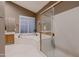 Bright main bathroom showcasing a soaking tub, glass shower, and ample space at 12754 E Laurel Ln, Scottsdale, AZ 85259
