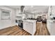 Open-concept kitchen showcasing stainless steel appliances with access to living and dining areas at 12826 N 29Th St, Phoenix, AZ 85032