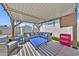 Inviting covered outdoor seating area featuring comfortable furniture and stylish decor at 12826 N 29Th St, Phoenix, AZ 85032
