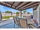 Charming backyard pool with covered patio and dining area, ideal for outdoor living at 12826 N 29Th St, Phoenix, AZ 85032