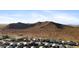 Panoramic aerial view of the neighborhood featuring desert mountain views at 13406 W Rowel Rd, Peoria, AZ 85383