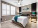 Stylish bedroom featuring a comfortable bed, modern lighting, and elegant decor at 13406 W Rowel Rd, Peoria, AZ 85383