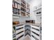 Organized pantry with ample shelving and storage for kitchen essentials at 13406 W Rowel Rd, Peoria, AZ 85383