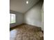 Cozy bedroom with a large window overlooking the lawn, perfect for natural light at 14002 N 49Th Ave # 1120, Glendale, AZ 85306