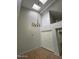 The dining room features a chandelier, skylights, and closet near an open entryway at 14002 N 49Th Ave # 1120, Glendale, AZ 85306