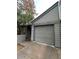 Two-story home featuring gray siding and a two-car garage with a driveway, showcasing curb appeal at 14002 N 49Th Ave # 1120, Glendale, AZ 85306