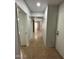 Tiled hallway leads through the home, connecting various rooms and spaces for easy access at 14002 N 49Th Ave # 1120, Glendale, AZ 85306