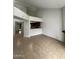Open living space with high ceilings adjacent to the breakfast bar and kitchen area at 14002 N 49Th Ave # 1120, Glendale, AZ 85306