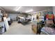 A cluttered garage with a vehicle trailer at 14014 N 57Th Way, Scottsdale, AZ 85254