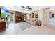 Cozy living room featuring a fireplace, a comfortable sofa, and recessed lighting at 14014 N 57Th Way, Scottsdale, AZ 85254
