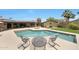 Inviting backyard pool with a seating area, ideal for outdoor relaxation and entertainment at 14014 N 57Th Way, Scottsdale, AZ 85254
