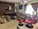 Comfortable living room with a TV, stylish furniture, and natural light at 1402 E Wescott Dr, Phoenix, AZ 85024