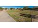 Beautiful community greenbelt with walking paths, green spaces, and desert landscaping at 14253 W El Cortez Pl, Surprise, AZ 85387