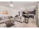 Inviting living room with neutral tones and an open layout, perfect for entertaining at 14253 W El Cortez Pl, Surprise, AZ 85387