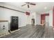 Large bonus room offers safe storage and access to the upper level at 14604 W Banff Ln, Surprise, AZ 85379