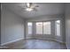 Bright bedroom featuring large bay windows that provide ample natural light and pleasant outdoor views at 15067 W Taylor St, Goodyear, AZ 85338