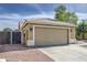 Inviting single-Gathering home featuring a neutral color palette, desert landscaping, and an attached two car garage at 15067 W Taylor St, Goodyear, AZ 85338