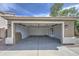 Spacious two-car garage offering ample space for parking and storage with a convenient water heater and interior access door at 15067 W Taylor St, Goodyear, AZ 85338