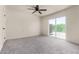 Bedroom with carpet, and sliding glass door to balcony at 16336 E Palisades Blvd # 4, Fountain Hills, AZ 85268