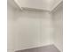 Walk-in closet featuring carpeted floor and shelving at 16336 E Palisades Blvd # 4, Fountain Hills, AZ 85268