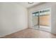 Dining area with tile flooring and sliding glass door to the patio at 16336 E Palisades Blvd # 4, Fountain Hills, AZ 85268