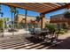 Relaxing outdoor seating area adjacent to the community pool, perfect for entertaining at 16336 E Palisades Blvd # 4, Fountain Hills, AZ 85268