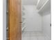 Walk-in closet with ample shelving and storage space for organizing belongings at 1704 E Hackamore St, Mesa, AZ 85203