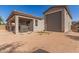 Spacious backyard showcasing the detached garage, ideal for storage and hobbies at 1736 E Joelle Dr, Casa Grande, AZ 85122