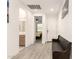 Hallway leads to the front door and bedrooms; natural light and a neutral palette create an inviting space at 1736 E Joelle Dr, Casa Grande, AZ 85122