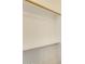 Bright closet space featuring a shelf and wooden hanging rod at 17789 W Bridger St, Surprise, AZ 85388