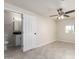 Bedroom leading into bright bathroom featuring modern fixtures at 1852 N Grand St, Mesa, AZ 85201