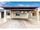Spacious covered carport area with brick pillars, offering ample parking and protection at 1852 N Grand St, Mesa, AZ 85201