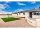 Single-story home with manicured front yard, gravel landscaping, and modern turf at 1852 N Grand St, Mesa, AZ 85201