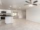 Bright, open-concept kitchen featuring stainless steel appliances and island counter at 1852 N Grand St, Mesa, AZ 85201