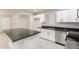 Bright kitchen features white cabinets, granite countertops, and stainless steel appliances at 1852 N Grand St, Mesa, AZ 85201