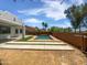 Home exterior displaying a private backyard that features a pool and ample room to play at 19973 E Thornton Rd, Queen Creek, AZ 85142