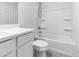 Clean bathroom with a shower-tub combination and a modern white vanity at 2181 N 211Th Dr, Buckeye, AZ 85396
