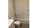 Bright bathroom with modern fixtures featuring a shower-tub combination and stylish vanity at 2181 N 211Th Dr, Buckeye, AZ 85396