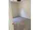 Comfortable bedroom with neutral carpeting and ample natural light at 2181 N 211Th Dr, Buckeye, AZ 85396