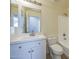 Updated bathroom with a modern vanity, bright lighting, and a shower-tub combination at 22010 W Solano Dr, Buckeye, AZ 85326