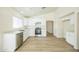Bright kitchen featuring white cabinets, stainless steel appliances, and modern countertops at 22010 W Solano Dr, Buckeye, AZ 85326